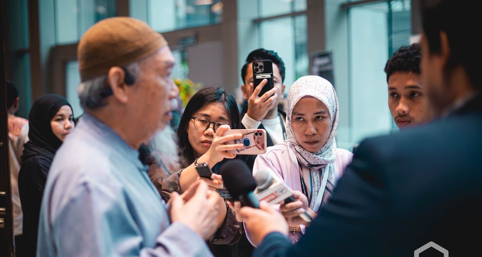A revert sharing their story with the media at NMCC 2025